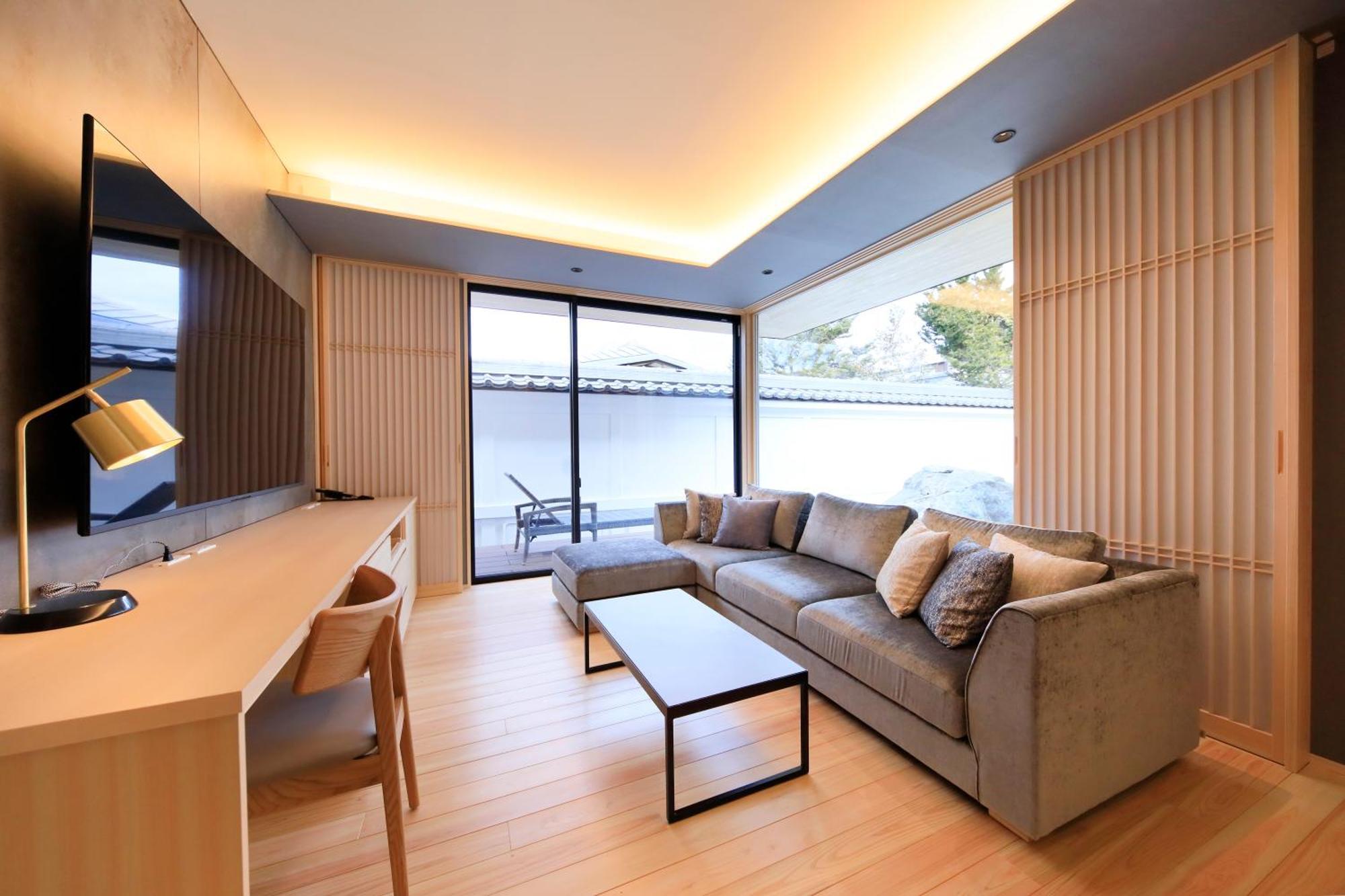 Fuji Onsenji Yumedono Hotel Fujikawaguchiko Exterior photo A living room in a Japanese house